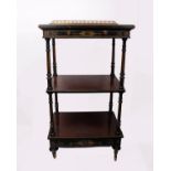 Gillows & Co. An ebonised wood and Amboyna three tier whatnot. Single drawer to top and bottom shelf
