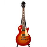 An Epiphone 'Les Paul' standard electric string guitar with sunburst body and rosewood neck - serial