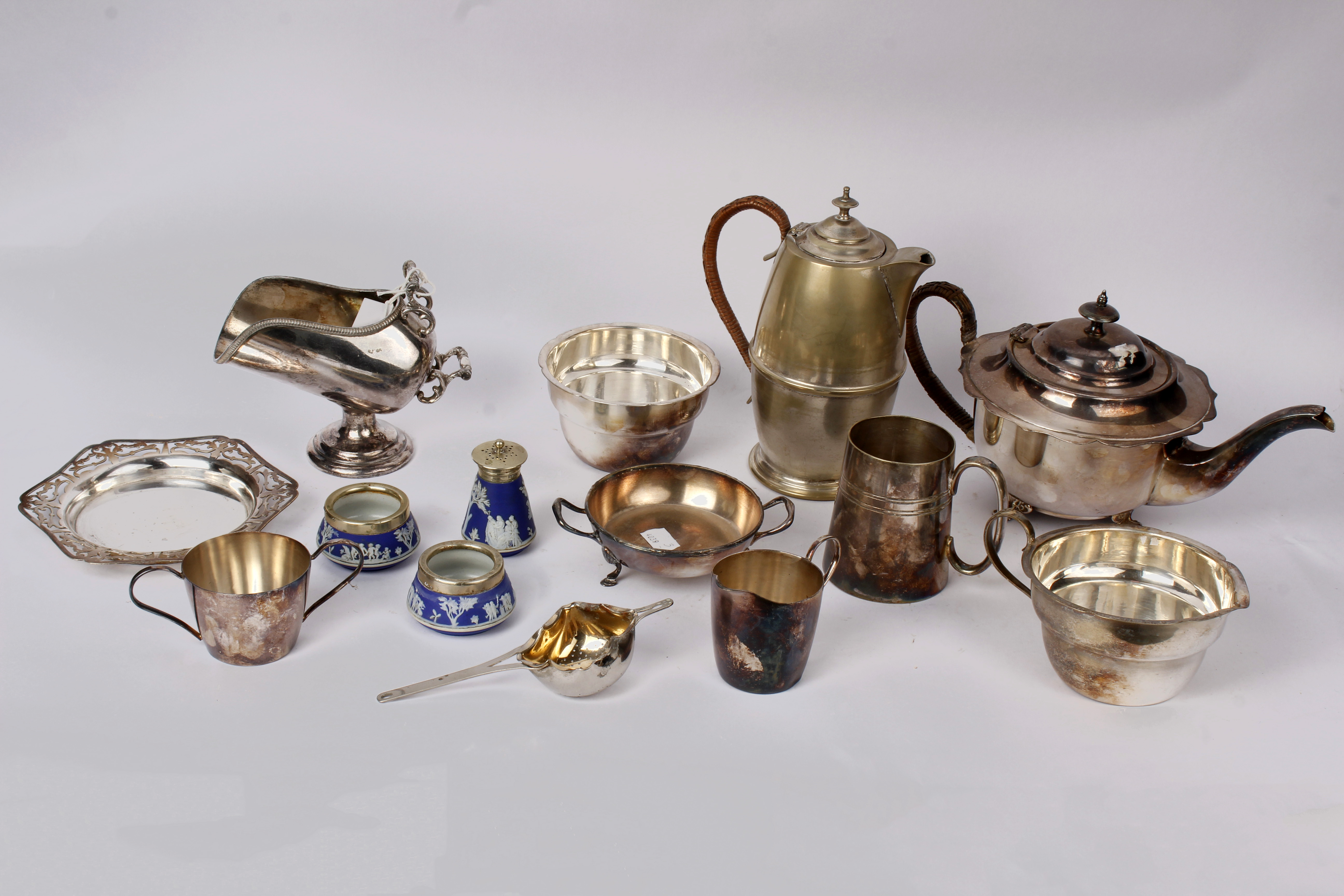 A collection of electroplated wares to include a coffee & tea pot, tankard plus other items