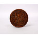 A fruit wood table top snuff box with lacquered interior and carved top with inscription 'Retour
