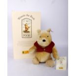 A partially boxed Steiff 'Winnie the Pooh' from 1999, Limited edition of 10,000 piece worldwide.