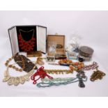 A collection of costume jewellery to include necklaces, earrings, brooches and a white metal