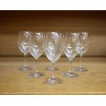 A set of six Baccarat French crystal white wine glasses, engraved Baccarat to each base.