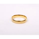 A 22ct gold wedding band. 4.2g Size Q.