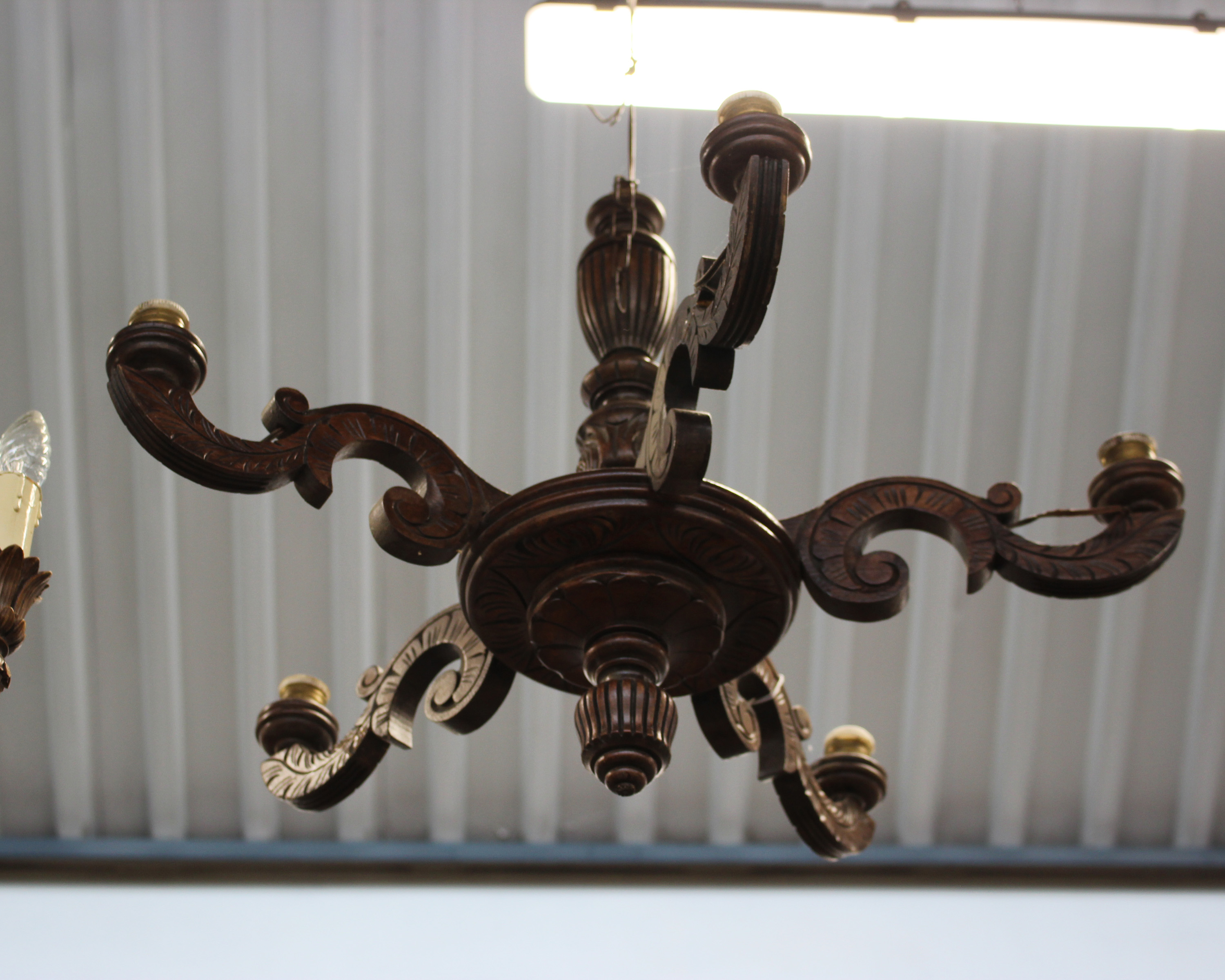 Two Edwardian carved oak six branch chandeliers in the arts and craft style larger one signed A. - Image 3 of 3