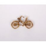 A 14k gold brooch in the form of a bicycle. 2.2g