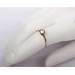 A 9ct gold and single stone CZ ring.. Size Q.