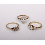 Three 9ct gold and cubic zirconia rings. 6.5g