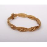 An 18ct gold fancy link bracelet. 16.2g