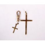 A 9ct gold crucifix pendant on a 9ct gold lobster clasp. 6.1g