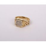 A 15k gold and cubic zirconia dress ring. Size U. 6g.