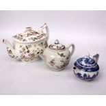 Three Oriental style ceramic teapots.