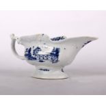 An 18th Century Worcester Porcelain Sauce boat., decorated with the Oriental country scene in