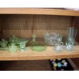 A collection of Uranium/Vaseline glass to include a dressing set, Posey vase, candlestick, plate and