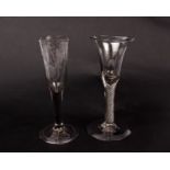 An 18th air twist stem wine glass with trumpet bowl on folded foot together with an engraved ale