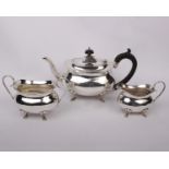 A sterling silver three piece tea set by Joseph Gloster Ltd Birmingham. 1915. 740g.