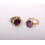 Two 9ct gold and amethyst ladies dress rings both set with large free cut amethyst in an open work