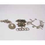 A collection of sterling silver and white metal items.