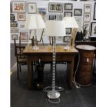 A modern crystal column floor lamp plus 2 x matching table lamps with matching shades in cream