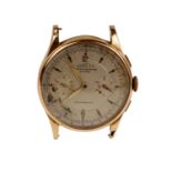 A 14k gold Gentleman's wristwatch by Coressa Chronographe Swiss.