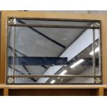 A modern powder coat effect metal framed wall mirror.Dimensions 110cm(H) x 76cm(W)