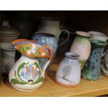 A collection of stoneware and studio pottery items