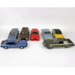 A collection of seven 1:18 scale unboxed Ford and a unboxed Rover cars. To include Greenlight 1976