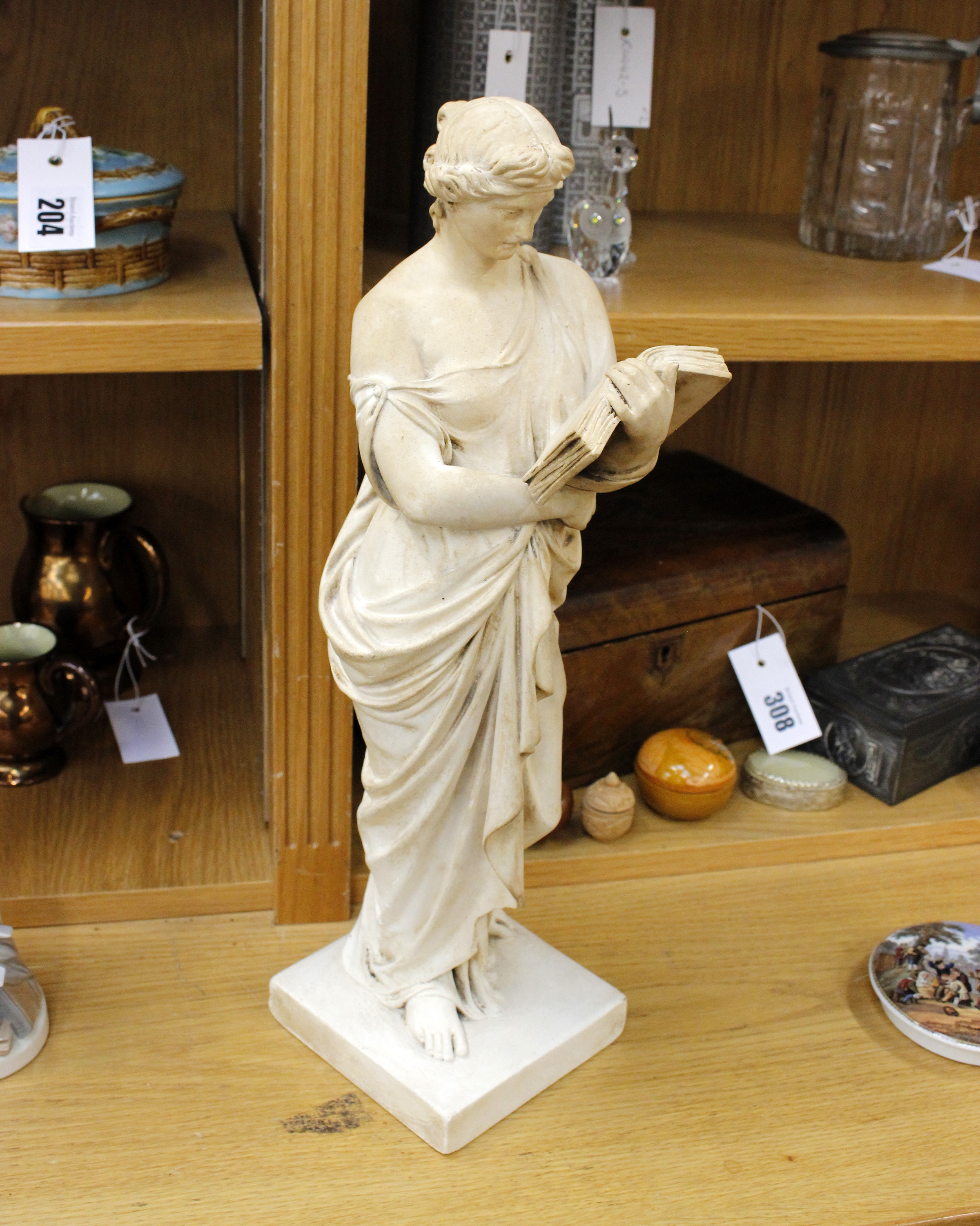 A German plaster cast model of a classical maiden dated 1876 Berlin, with indistinct signature to
