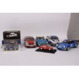 A collection of racing vehicles varying in scale and manufacture to include Minichamps, Solido, BOS,