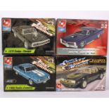 Four film related AMI car kits to include a 1970 Dodge Charger and 1969 Yenko Camaro from The Fast &