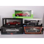 Five boxed 1:18 scale model cars to include Welly model 1968 Chevrolet Camaro 228 and 1980's VW