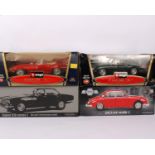 Four boxed 1:18 scale Jaguar model cars to include a Model Icon 1962 Jaguar Mark 2, a Paragon 1971