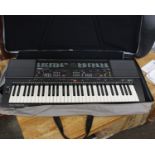 A Yamaha P.S.R 400 electric keyboard, with no stand.