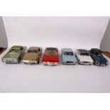 A collection of four interactive 1:18 scale model cars and two Minichamps Opel Rekords. Interactives