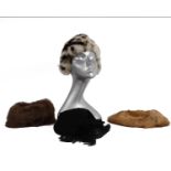 A collection of early to mid 20th century fur and feather hats