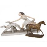 An Art Deco Style Statue of a Lady and Two Hounds and A Brass Statue of a Horse