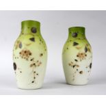 A pair of opaque baluster glass vases in the Aesthetic style, enamel overlaid with Persimmon