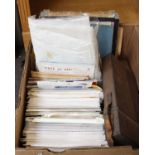 A Box of Collector's Items Including Stamps and Militaria.A large collection of stamps, a button