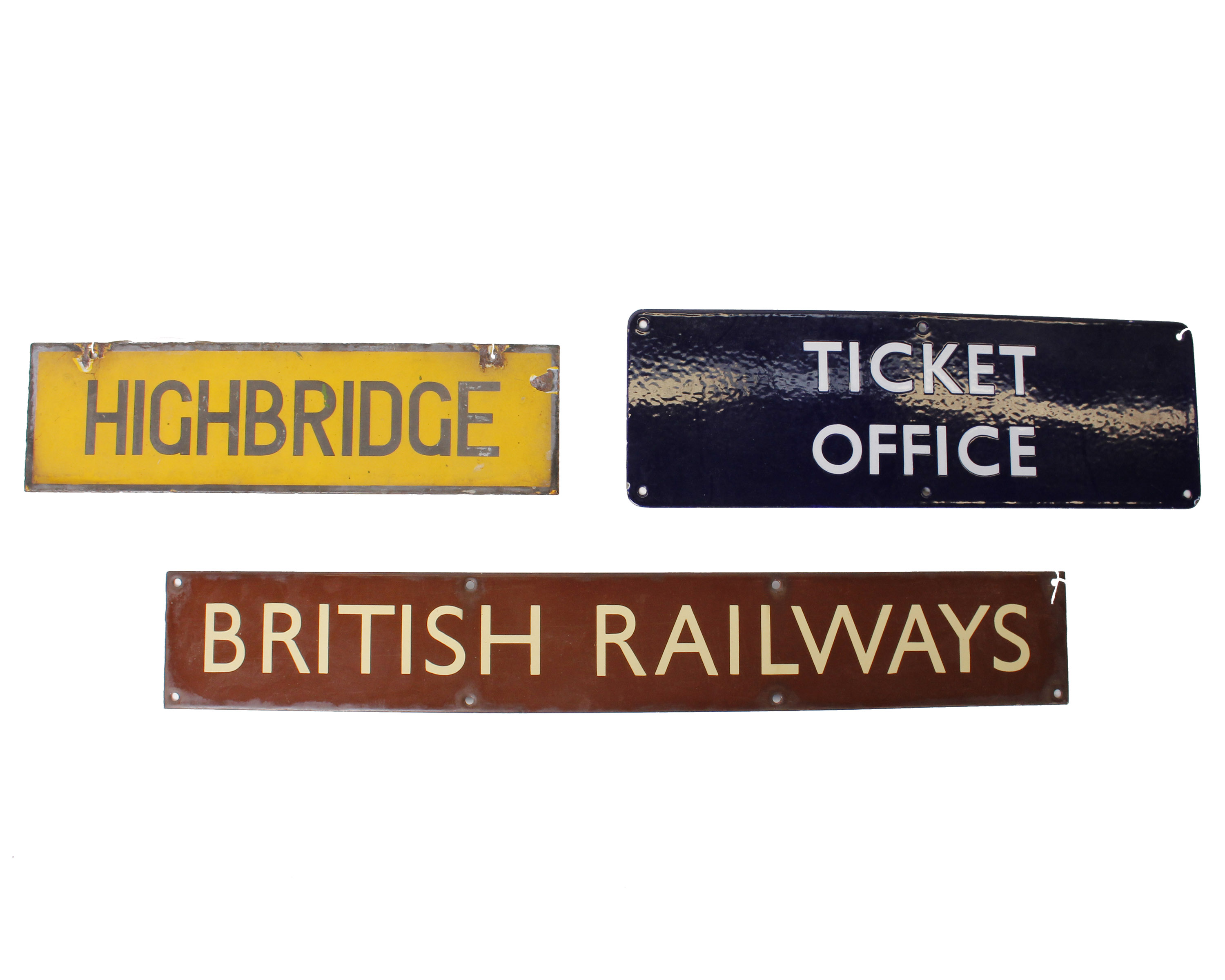 A British Railways brown enamel sign with a blue enamel Ticket Office sign along with a yellow