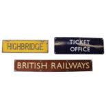 A British Railways brown enamel sign with a blue enamel Ticket Office sign along with a yellow
