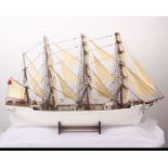 A model of The Queen Margaret four-masted steel barque ship built in 1893 by A. MacMillan & Son. The