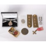 A collection of militaria to included RFC epaulette plus other items of militaria and replica