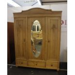 A Substantial Federal Three Door Pine Wardrobe With Mirrored Door With a mirrored central door and