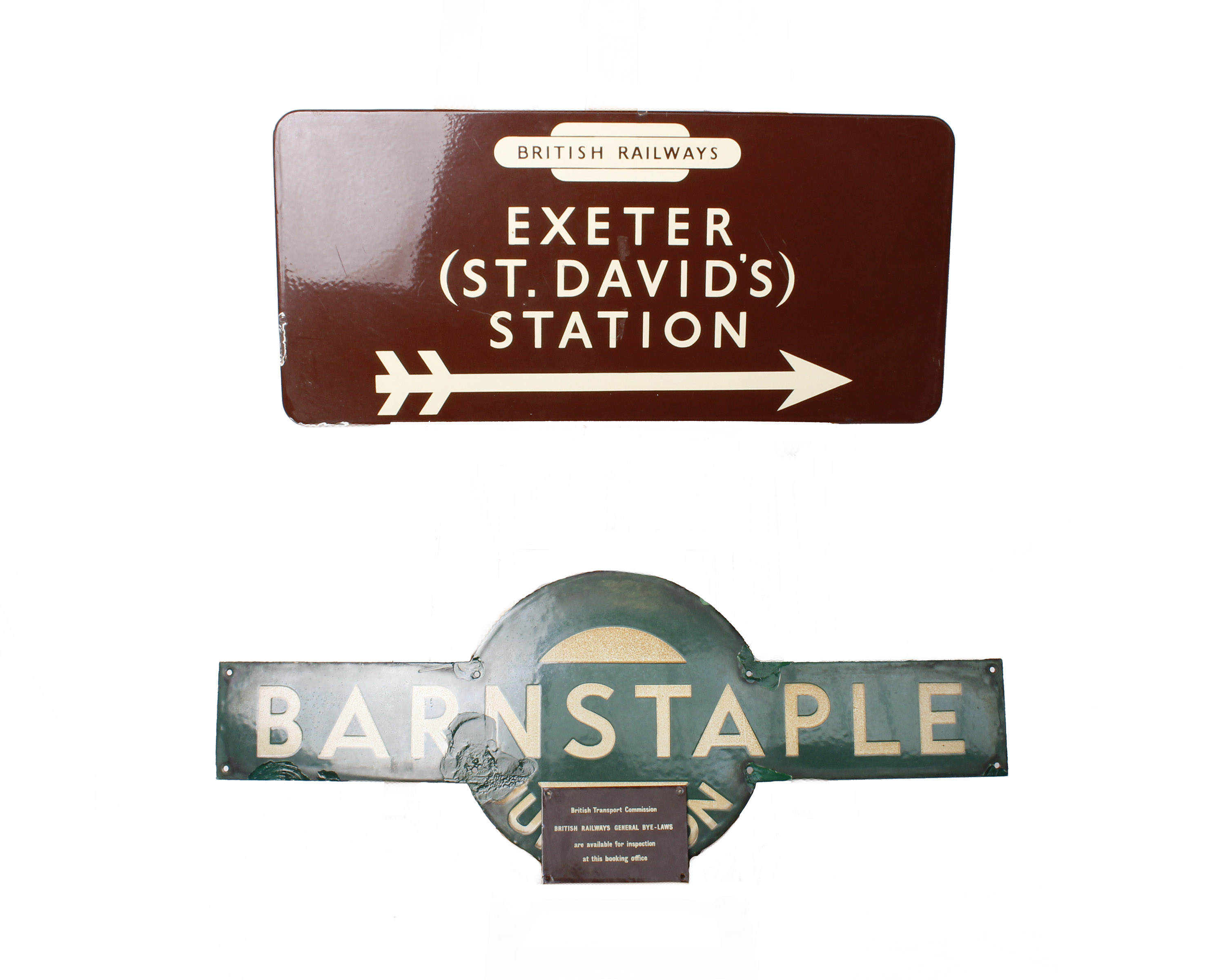 A British Railways Exeter St David and Barnstable sign with Transport Commission sign for Road