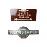 A British Railways Exeter St David and Barnstable sign with Transport Commission sign for Road