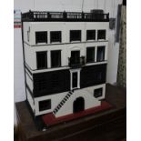 A substantial mansion style dolls house in black and white. Balustrade to roofDimensions 100cm (H)
