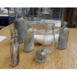 Eight vintage bottles to include circa 1930 Glaxo feeding bottle plus other, liquid blue bottles x 3