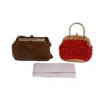 Three ladies handbags, one faux leather with clasp, a coral coloured beaded and macramé and a pink