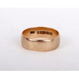 A 9ct gold ring, the plain polished band stamped 375 with Birmingham hallmarks, ring size W, 4.7g