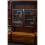 A 1960's Portwood of Stockport lounge wall unit, the base fitted with four drawers, recess above and